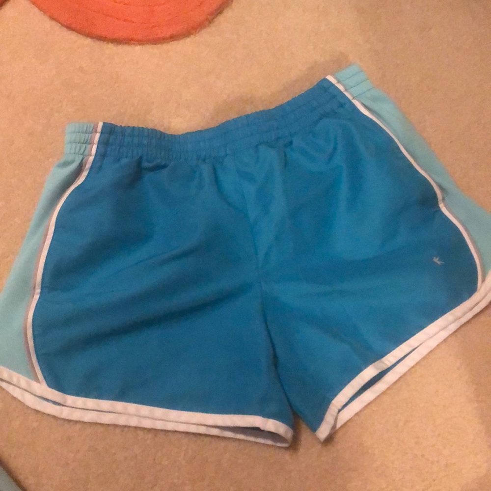 Blue running shorts.